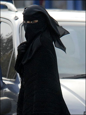 niqabi woman in the street %photo