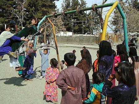 Afghan children play in a park