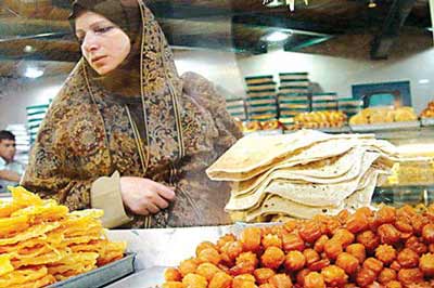 Woman shops for Ramadan meal