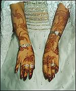 UAE woman with henna on hands
