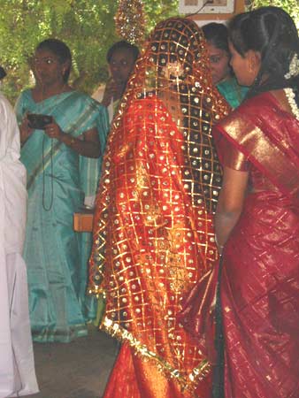 Scenes from a Muslim wedding in India Welcoming the bride