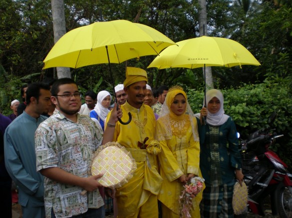 Best man groom bride and bridesmaid at a Malaysian Muslim wedding