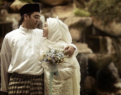 A Malaysian Muslim couple at their wedding