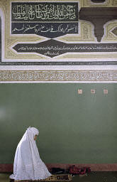 Muslim woman prays
