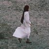 A Muslim woman walking