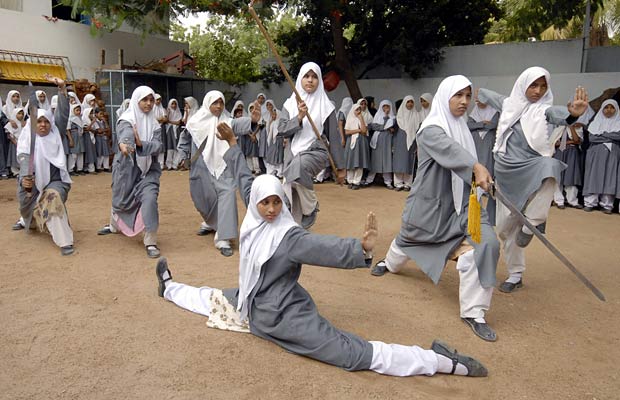 Indian Muslim Girls A group of Indian Muslim girls at a school in Hyderabad training in the martial art of Wushu, a type of Kung Fu