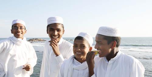 Muslim teenage boys at the seashore in Sri Lanka