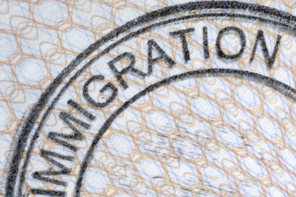 Passport immigration stamp, green card