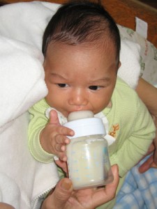Baby with bottle