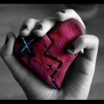 heartbroken, heart in hand