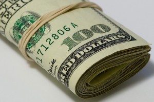 Money roll, dollar bills, cash