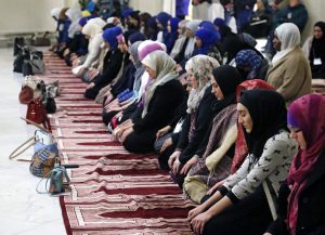 Muslim women praying