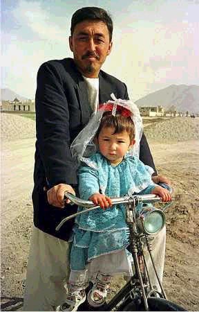 An Afghan child in her new Eid clothes