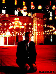 Al Hajj Malik El-Shabazz praying