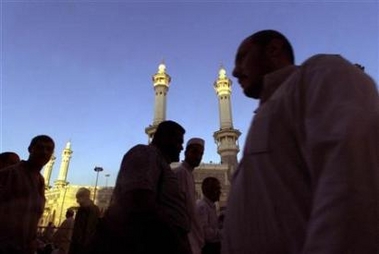 Muslims making tawaaf around the Ka'bah just before Maghreb prayer