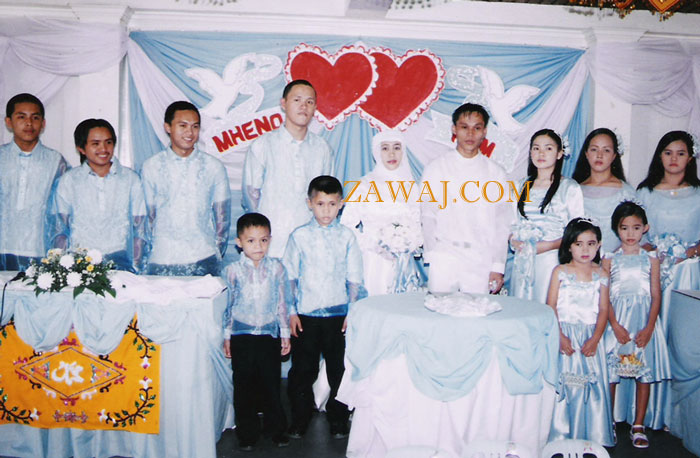 The couple with the groom's best men and the bridesmaids