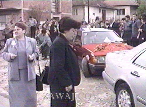 The bride and groom drive away