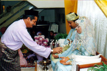 Couple being blessed