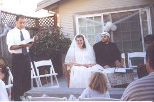 Groom's friend Ardeshir recites the Qur'an before the ceremony