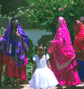 A child in a white dress